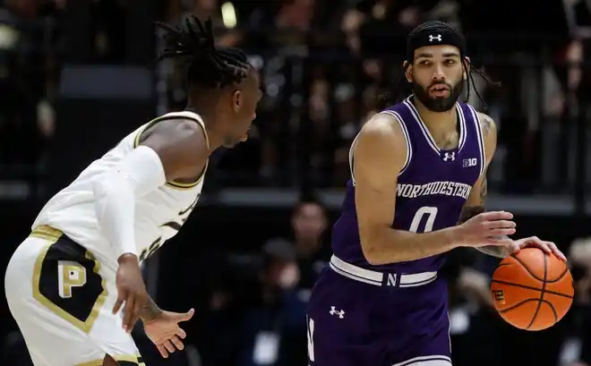 Purdue Boilermakers guard Lance Jones (55) guards Northwestern Wildcats guard Boo Buie (0) during the NCAA men’s basketball game, Wednesday, Jan. 31, 2024, at Mackey Arena in West Lafayette, Ind.