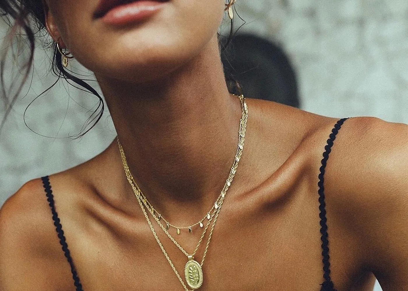 Model wearing Wildthings gold jewellery in Bali, Indonesia