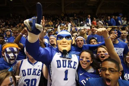 Shows the Duke Blue Devil mascot with a group of 