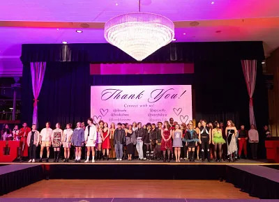 Hosts, designers and models take the stage for a final bow after the Fashion in Business & Union Programming Council’s 2nd Annual fashion show. Photo: John Barkiple