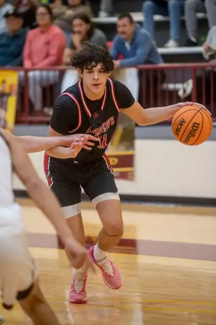 Andrews’ Cameron Rattler moves up the court, January 30, 2024, in Cherokee.