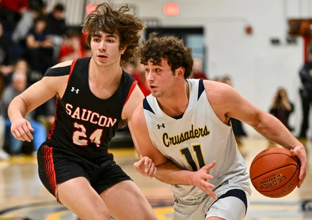 Notre Dame-Green Pond's and Dainn Vassallo drives up court against Saucon Valley's Adam Clark during a boys basketball game on Wednesday, Jan. 31, 2024, at Notre Dame-Green Pond High School. (April Gamiz/The Morning Call)