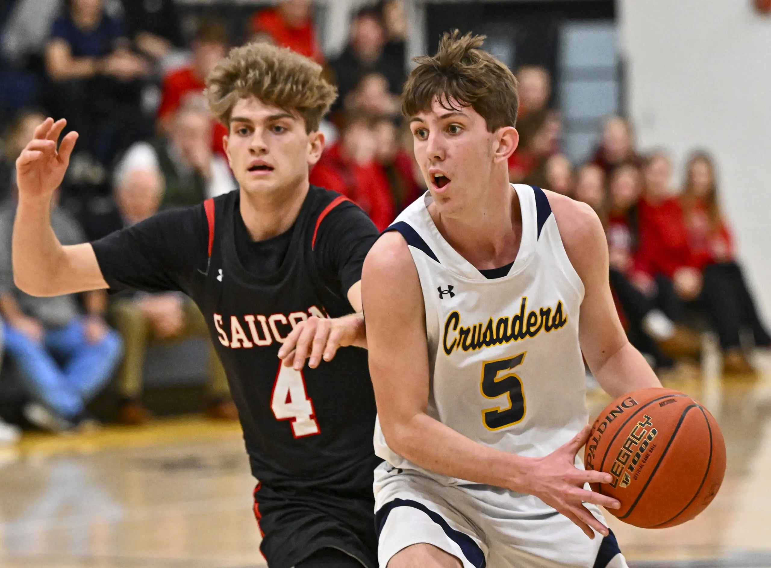 Notre Dame-Green Pond's Colin Boyle drives up court against Saucon Valley's Braden Weiss during a boys basketball game on Wednesday, Jan. 31, 2024, at Notre Dame-Green Pond High School. (April Gamiz/The Morning Call)