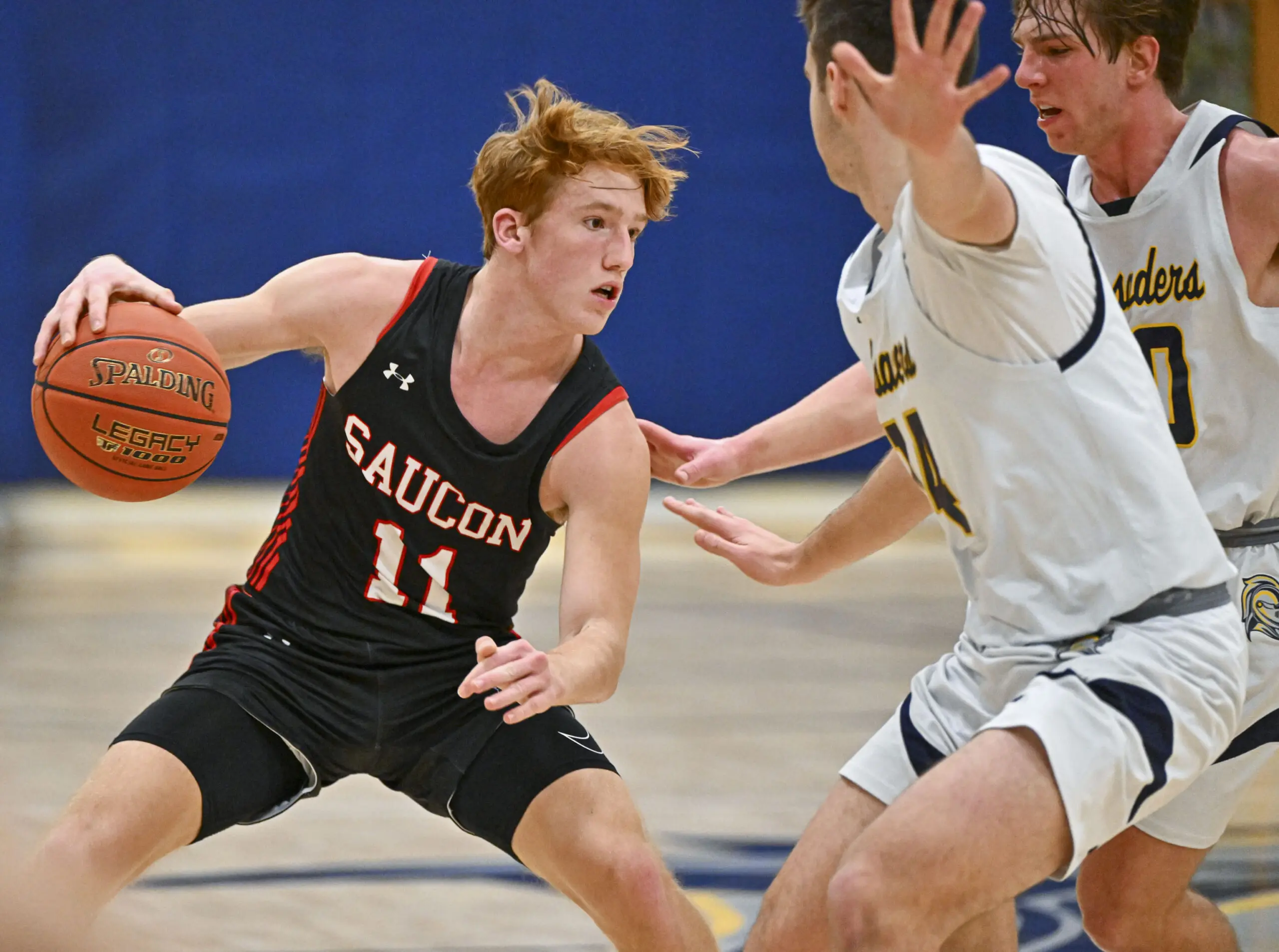 Saucon Valley's Jack Robertson drives against Notre Dame-Green Pond's Andrew Lessig and Cameron Bohn during a boys basketball game on Wednesday, Jan. 31, 2024, at Notre Dame-Green Pond High School. (April Gamiz/The Morning Call)