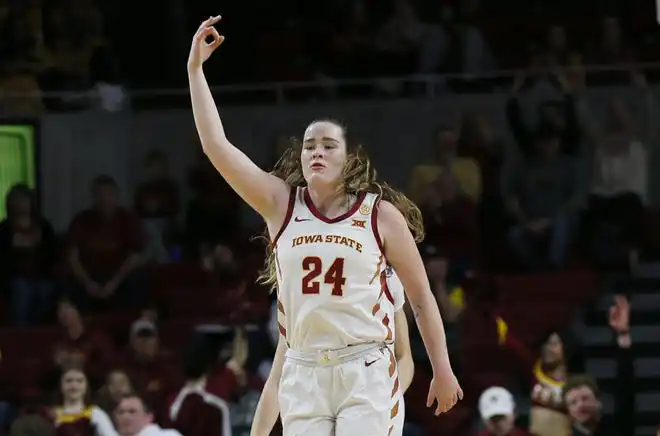 Iowa State Cyclones forward Addy Brown (24) reacts after a three-point shot against Oklahoma State Cowgirls during the first quarter in the Big-12 conference matchup at Hilton Coliseum on Wednesday, Jan. 31, 2024, in Ames, Iowa.