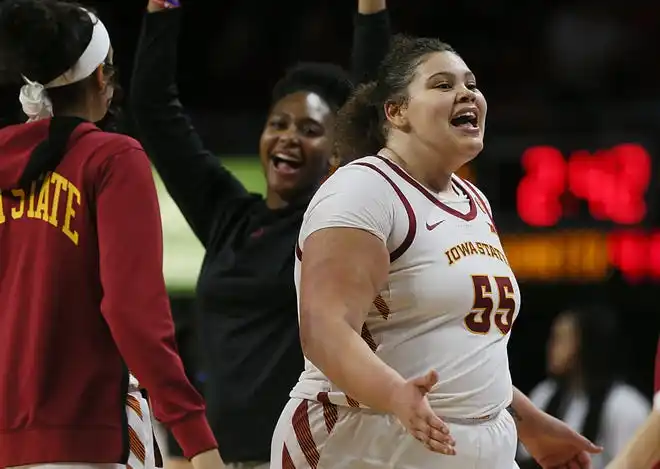 Iowa State Cyclones center Audi Crooks (55) celebrates with team mates during the fourth quarter in the Big-12 conference matchup at Hilton Coliseum on Wednesday, Jan. 31, 2024, in Ames, Iowa.