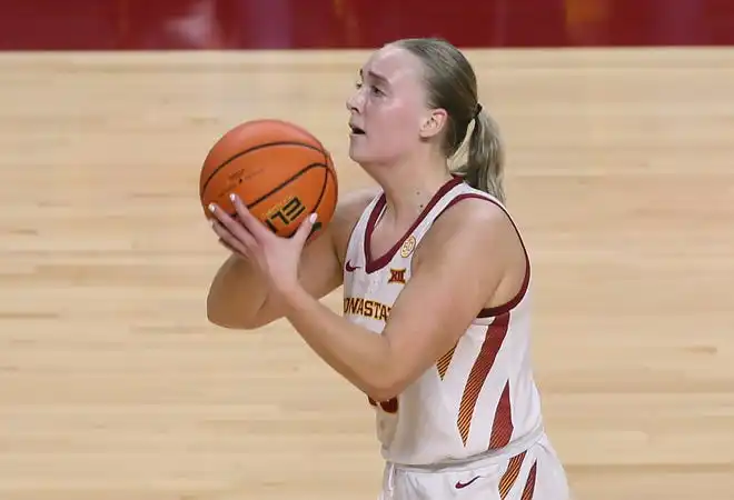 Iowa State Cyclones guard Hannah Belanger (13) takes a three-point shot over Oklahoma State Cowboys during the third quarter in the Big-12 conference matchup at Hilton Coliseum on Wednesday, Jan. 31, 2024, in Ames, Iowa.