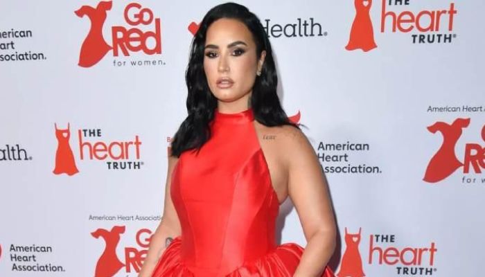 Demi Lovato: from Gown to Glamour! Rockstar Surprises During Red Dress Concert