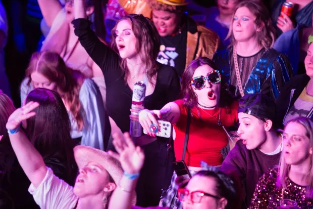 Fans dance and sing along at Broadway Rave, a touring dance party celebrating musical theater and show tunes at St. Andrew's Hall in Detroit on Friday, January 19, 2024. (Brian Widdis/for the Chicago Tribune)