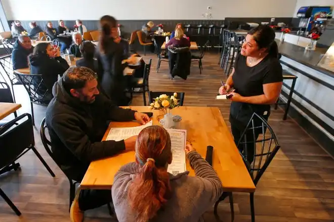 Lisa Soares takes an order at the new Toast n' Jam breakfast restaurant on Acushnet Avenue in New Bedford.