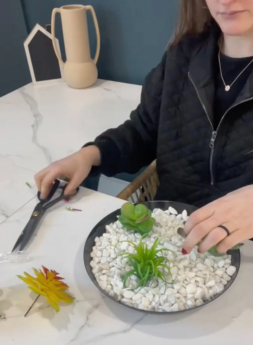 Emma demonstrated how to make a faux succulent garden for your shelf