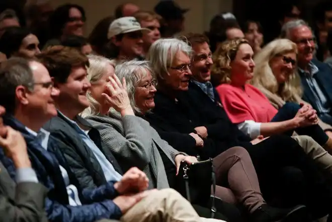 Attendees laugh as Jason Isbell speaks about his music and career as part of the Springfield Music Lecture Series at Rhodes College in Memphis, Tenn., on Wednesday, February 7, 2024.