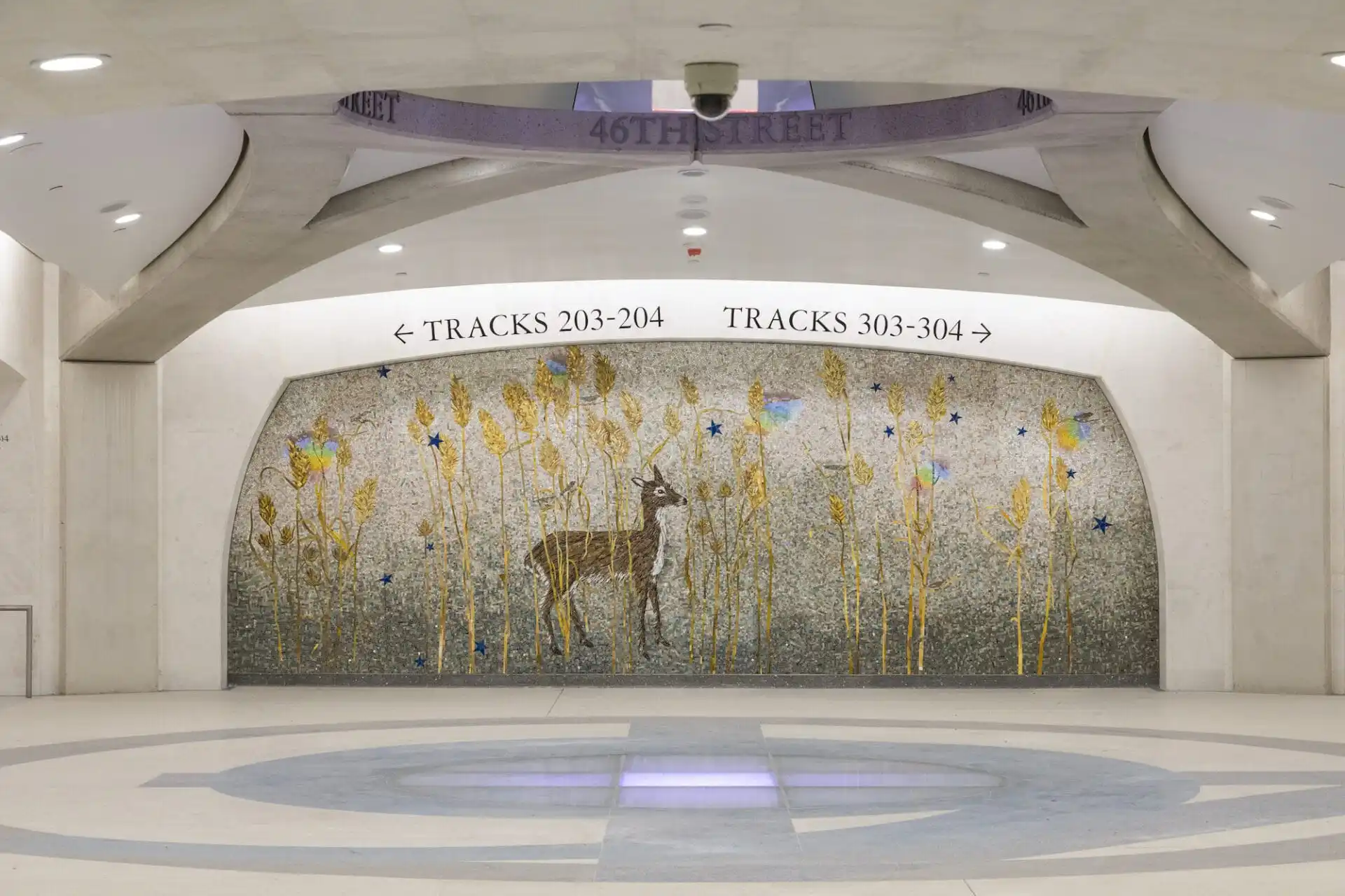 A mosaic of a deer in a wilderness by Kiki Smith in Grand Central Madison train station.