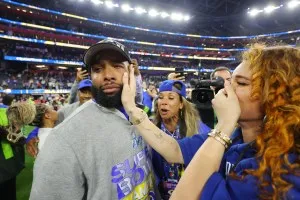 INGLEWOOD, CALIFORNIA - FEBRUARY 13: Odell Beckham Jr. #3 of the Los Angeles Rams reacts with his girlfriend Lauren Wood after Super Bowl LVI between the Cincinnati Bengals and the Los Angeles Rams at SoFi Stadium on February 13, 2022 in Inglewood, California. (Photo by Kevin C. Cox/Getty Images)