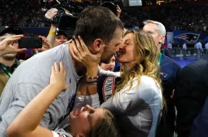 ATLANTA, GA - FEBRUARY 03:  Tom Brady #12 of the New England Patriots kisses his wife Gisele Bündchen after the Super Bowl LIII against the Los Angeles Rams at Mercedes-Benz Stadium on February 3, 2019 in Atlanta, Georgia. The New England Patriots defeat the Los Angeles Rams 13-3.  (Photo by Kevin C. Cox/Getty Images)