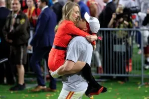 MIAMI, FLORIDA - FEBRUARY 02: Patrick Mahomes #15 of the Kansas City Chiefs celebrates with his girlfriend, Brittany Matthews, after defeating the San Francisco 49ers 31-20 in Super Bowl LIV at Hard Rock Stadium on February 02, 2020 in Miami, Florida. (Photo by Andy Lyons/Getty Images)