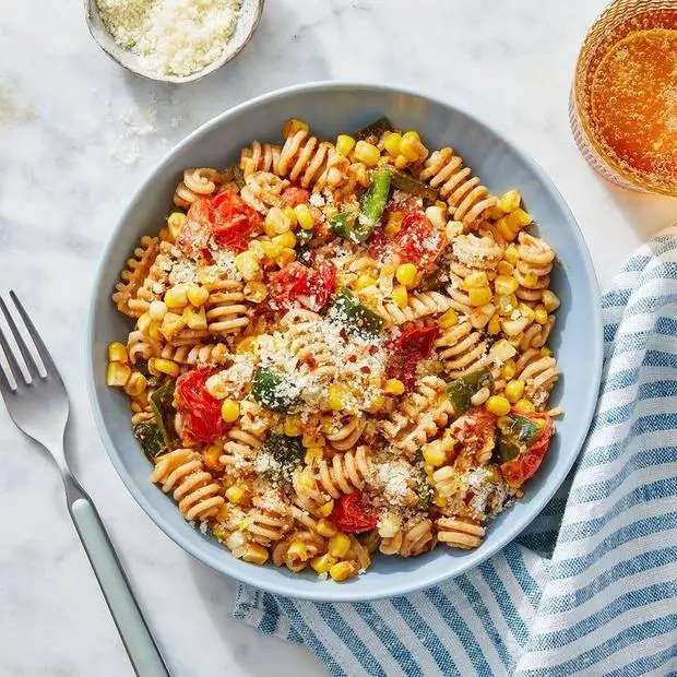 Whole Grain Romesco Pasta with Tomatoes, Corn & Poblano Pepper 