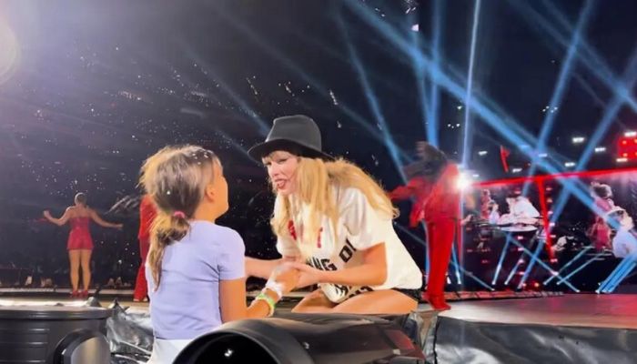 Taylor Swift Gives a ’22’ Cap to a Lucky Fan in Tokyo During the Eras Tour