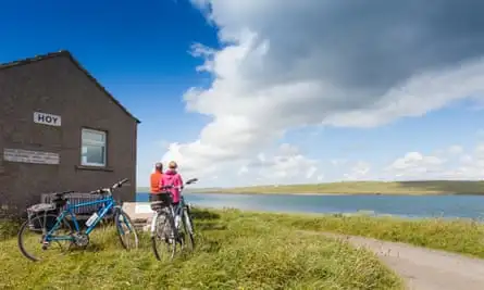 Cyclists waiting for the ferry from Hoy to mainland Orkney.