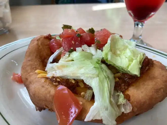 The Indian Taco at Sly Fox Den Too is made using fry bread, a traditional Indigenous food.