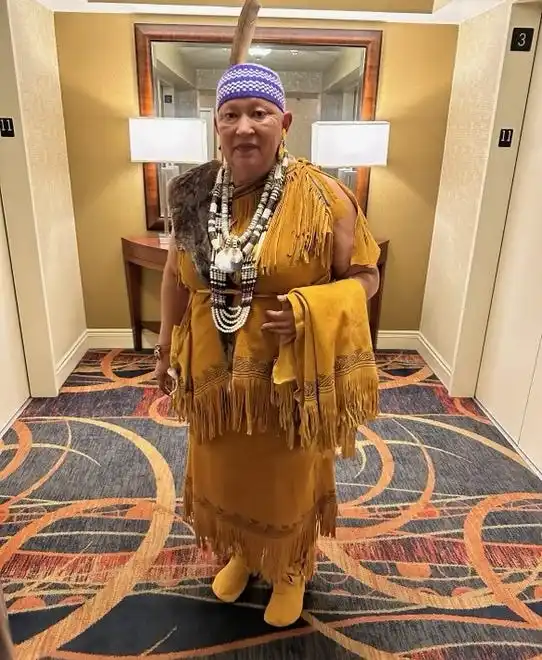 Mashpee Wampanoag Sherry Pocknett, owner of the Sly Fox Den Too, dressed in Native regalia to accept her 2023 award as Best Chef Northeast from the James Beard Foundation.