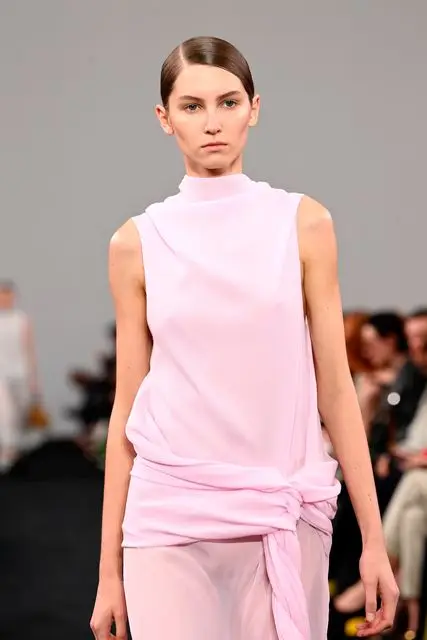 A model walks the runway at the JW Anderson show