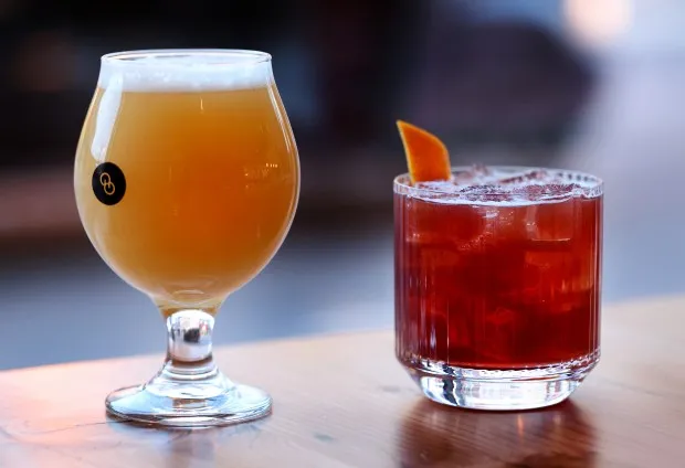 Other Half Brewing Green City beer, left, and the Ramova Old Fashioned cocktail at Ramova Grill and Taproom. (Chris Sweda/Chicago Tribune)