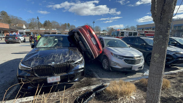 Car ends up sandwiched between SUVs in Wellesley shopping plaza crash