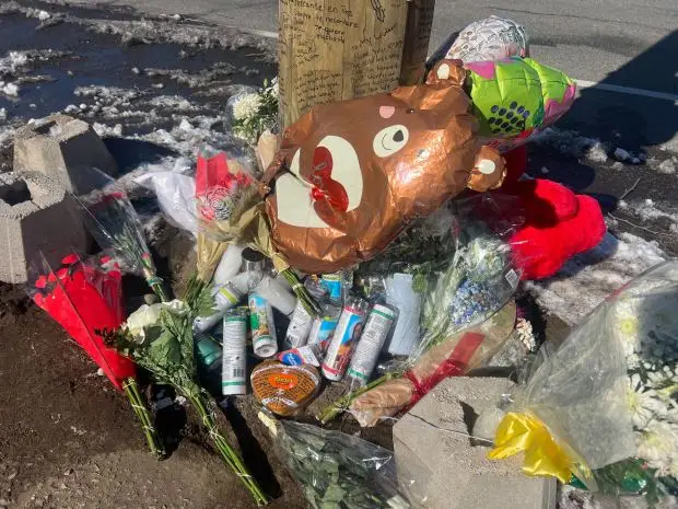 A memorial for Pablo Rivera is pictured at the scene of the crash on Rosedale Road near Lawrence Court in Valley Stream, New York. (Emma Seiwell / New York Daily News)