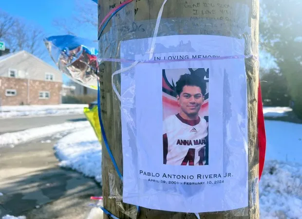 A memorial for Pablo Rivera is pictured at the scene of the crash on Rosedale Road near Lawrence Court in Valley Stream, New York. (Emma Seiwell / New York Daily News)