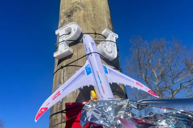 A memorial for Pablo Rivera is pictured at the scene of the crash on Rosedale Road near Lawrence Court in Valley Stream, New York. (Emma Seiwell / New York Daily News)