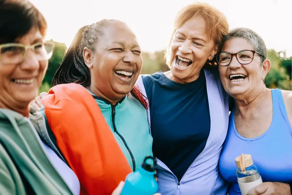 Multiracial sport senior women having fun together after exercise workout outdoor at city park