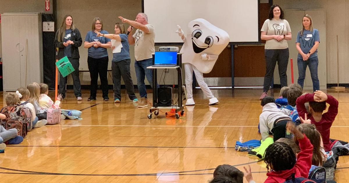 Local dentist celebrates Children’s Dental Health Month with students