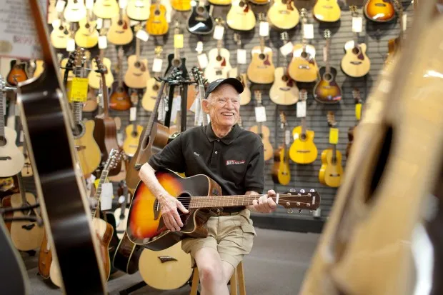 Bill Higgins poses for a photo at his store, Bill's Music, on Frederick Road in Catonsville in 2017. File photo