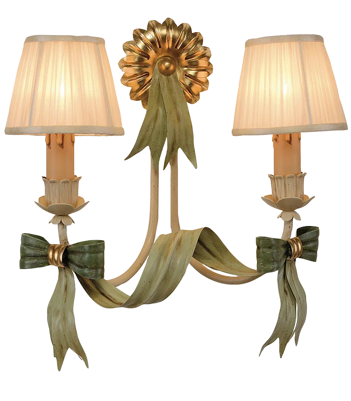 a double sconce with bows, lampshades and gold-leaf detailing