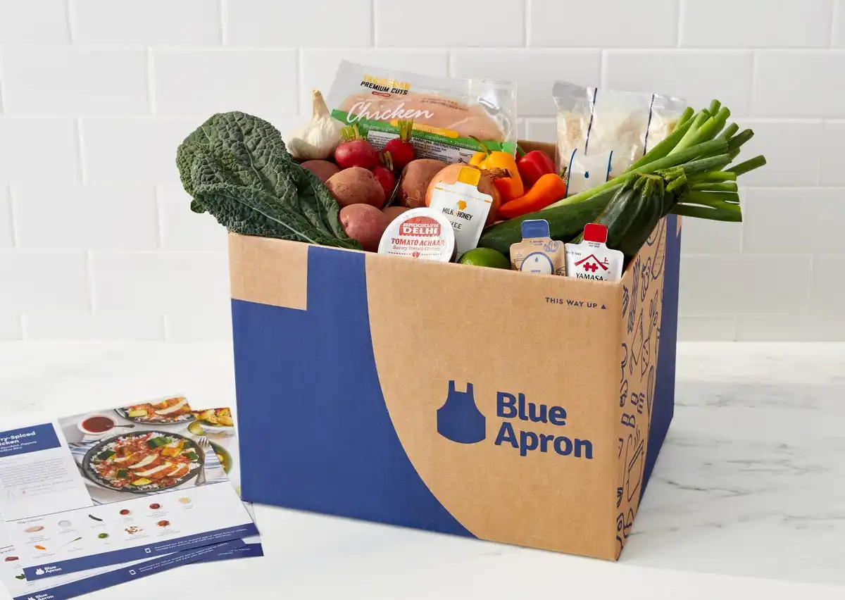 blue apron box with ingredients