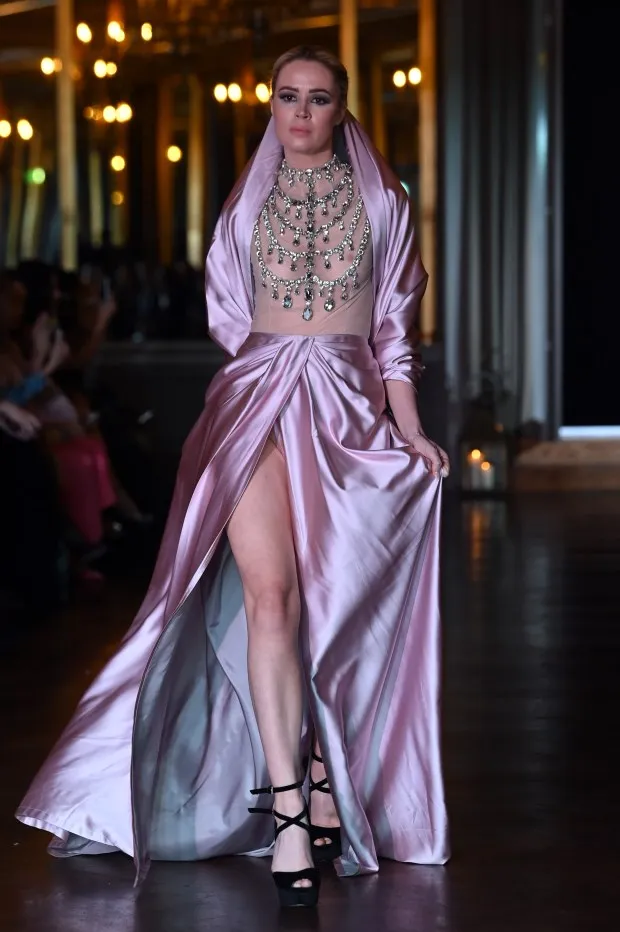 LONDON, ENGLAND - FEBRUARY 18: A model walks the runway at the Atelier Zuhra show during London Fashion Week February 2024 at Cafe Royal on February 18, 2024 in London, England. (Photo by Eamonn M. McCormack/Getty Images)