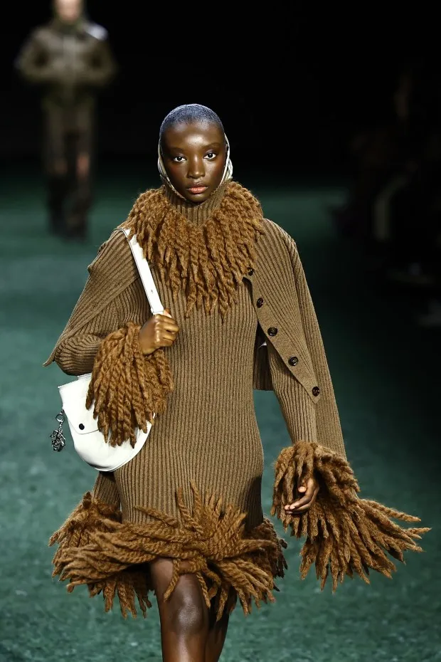 A model presents a creation during a catwalk presentation for British fashion house Burberry's Autumn/Winter 2024 collection, at London Fashion Week in London, on February 19, 2024. (Photo by HENRY NICHOLLS / AFP) (Photo by HENRY NICHOLLS/AFP via Getty Images)