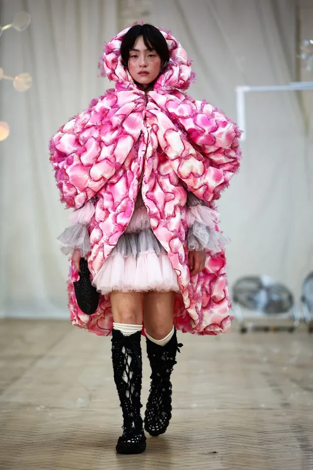 A model presents a creation by London-based designer Susan Fang during the Autumn/Winter 2024 collection catwalk presentation during London Fashion Week in London on February 19, 2024. (Photo by HENRY NICHOLLS / AFP) (Photo by HENRY NICHOLLS/AFP via Getty Images)