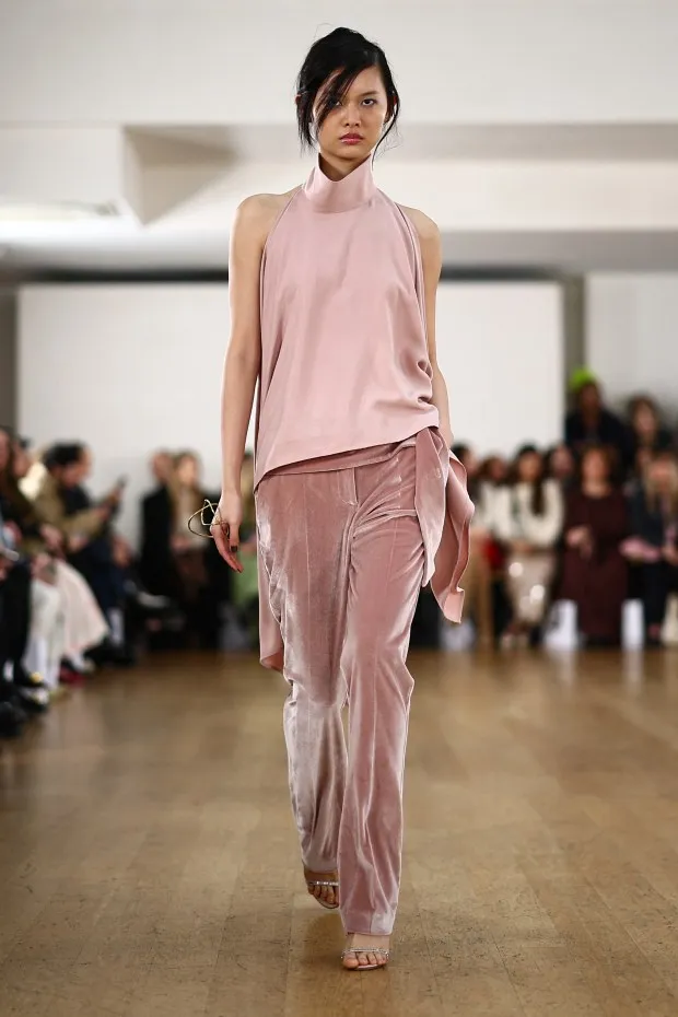 A model presents a creation by South Korean designer Eudon Choi during the catwalk presentation for his Autumn/Winter 2024 collection during London Fashion Week in London on February 18, 2024. (Photo by HENRY NICHOLLS / AFP) (Photo by HENRY NICHOLLS/AFP via Getty Images)