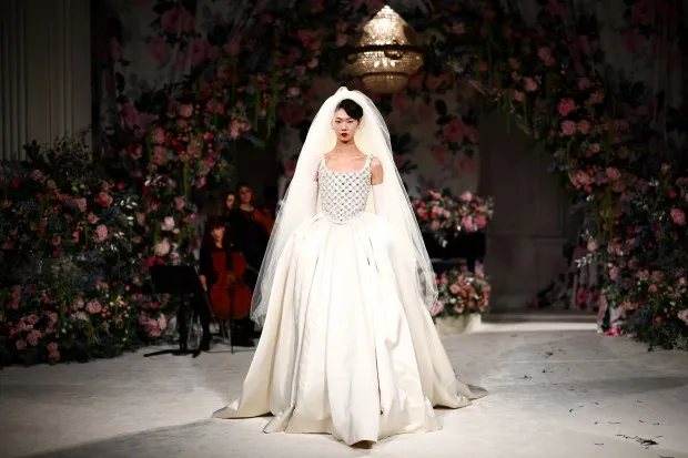 A model presents a creation by British designer Richard Quinn during the catwalk presentation for his Autumn/Winter 2024 collection during London Fashion Week in London on February 17, 2024. (Photo by HENRY NICHOLLS / AFP) (Photo by HENRY NICHOLLS/AFP via Getty Images)