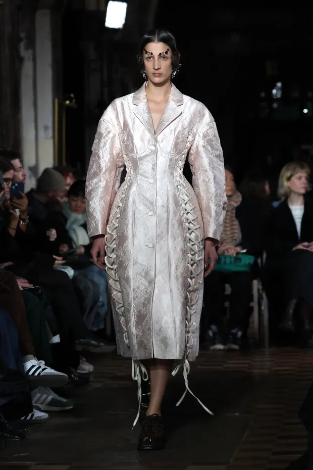 LONDON, ENGLAND - FEBRUARY 17: A model walks the runway at the Simone Rocha show during London Fashion Week February 2024 at St Bartholomew the Great, Barbican on February 17, 2024 in London, England. (Photo by Tristan Fewings/Getty Images)