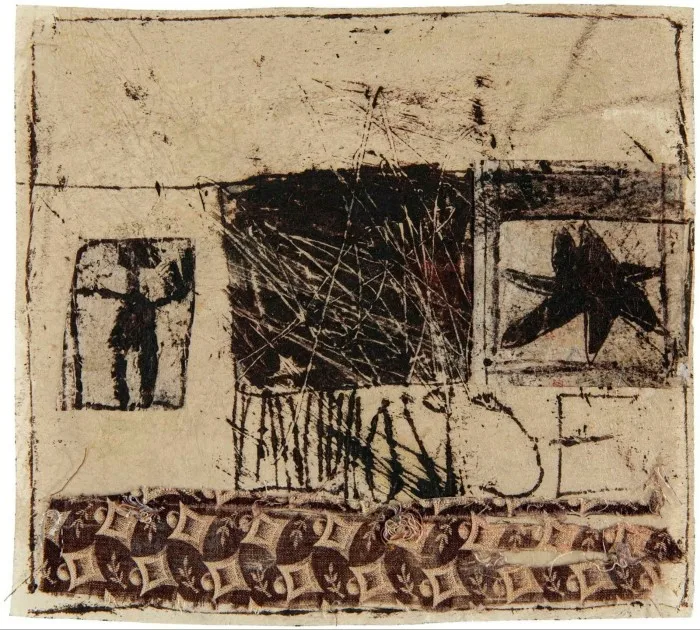 A mixed media collage is created from fabric, paper and ink and features a solid black star shape and a tiny humanoid figure, as well as runic writing
