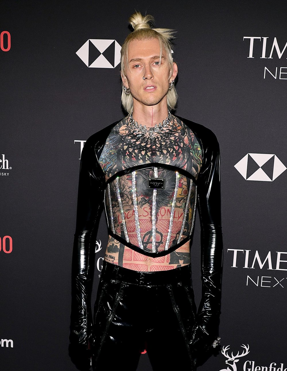 See the Striking Way Machine Gun Kelly Dramatically Covered His Tattoos