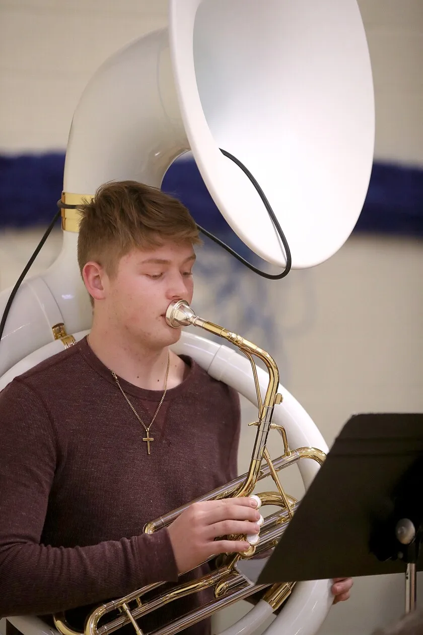 Student plays tuba.