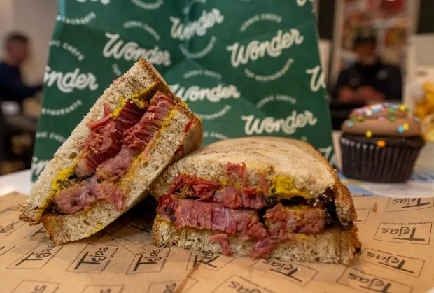 A pastrami sandwich from Tejas Barbecue was one of the items available Wednesday, Feb. 21, 2024, at the new Wonder food hall inside the Walmart at Richland Crossings shopping center in Richland Township. Wonder offers food from eight different restaurants including Tejas Barbeque, Fred's Meats & Bread and Alanza Pizza. (April Gamiz/The Morning Call)