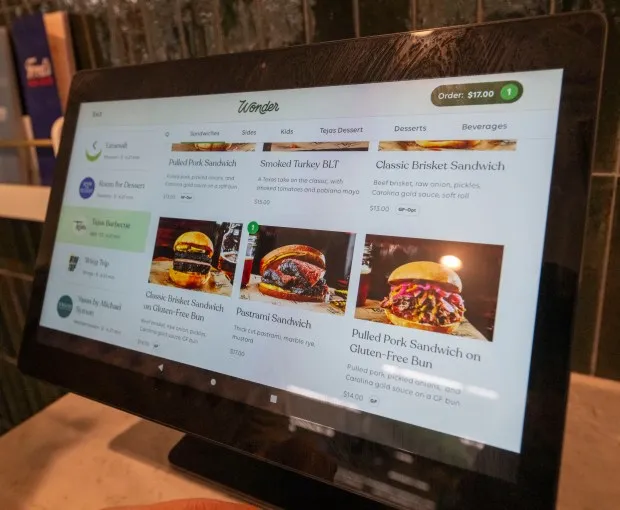 Touchscreen ordering offers menu items Wednesday, Feb. 21, 2024, at the new Wonder food hall inside the Walmart at Richland Crossings shopping center in Richland Township. Wonder offers food from eight different restaurants including Tejas Barbeque, Fred's Meats & Bread and Alanza Pizza. (April Gamiz/The Morning Call)