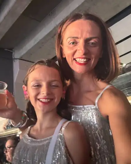 Kerrie and her daughter Vivian, wearing matching outfits at Taylor Swift’s MCG show