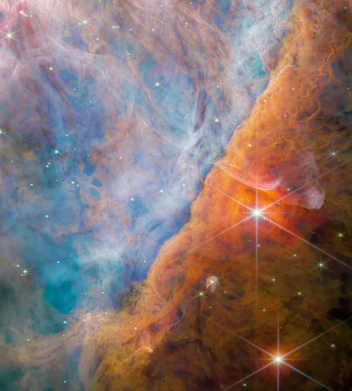 Image captured by Webb Telescope’s NIRCam (Near-Infrared Camera) showing a part of the Orion Nebula known as the Orion Bar. Credit: ESA/Webb, NASA, CSA, M. Zamani (ESA/Webb), PDRs4ALL ERS Team