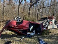 Car overturns violently in crash, people witness two walking down the road near Lakeside